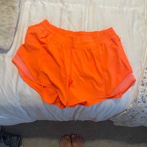 Neon Orange Lululemon Hotty Hot shorts 4 inch